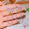 Novo Bow Pink Water Drops Tassel Brincos Girly Sweet e Fácil de Combinar Super Fada Chanel Brincos de diamante amarelo