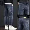 Jeans Masculino de Cintura Alta Tendência Marca de Luxo Corte Reto Solto Primavera/Outono 2026 Novo Versátil Elástico Casual Calça Longa