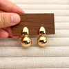 Nuevos Pendientes Redondos Transfronterizos Europeos y Americanos Creativos Diseño Simple Pendientes de Temperamento Fotosensibles de Gama Alta Pendientes para Mujer Venta al por Mayor