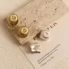 Aretes de Hilo de Fuegos Artificiales Spark de Doble Cara para Mujer, Diseño de Nicho, Nuevo Estilo Otoño e Invierno, Clips para Orejas de Bola Redonda, Pendientes Modelo Nuevo 2025