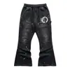 Pantalones de chándal jogger personalizados con efecto desgastado para hombre, con un atrevido diseño de estampado de espuma. Pantalones de chándal para hombre, modernos y de corte holgado