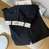 Falda negra de cintura alta con estampado de letras para mujer, estilo europeo de primavera y otoño, línea A, abertura trasera, longitud media, falda de traje de corte recto