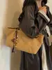 Bolso de mano exquisito de nicho estilo coreano, bolso de hombro, bolso para el antebrazo de uso diario, bolso de mujer, bolso tote de lunares, nuevo modelo para mujer