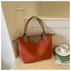 Bolsa Tote de Veludo Coteleê Estilo Coreano Casual Feminina Nova Moda Grande Capacidade Bolsa para o Dia a Dia Versátil de Ombro Único Tendência