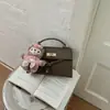 Bolso Pequeño de Mano Retro de Alta Gama Transfronterizo Nuevo para Mujer Diseño de Nicho Casual Bolso Kelly Elegante Bolso Cruzado de Hombro Único