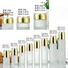 Set de Botellas al por Mayor para Productos de Cuidado de la Piel Acabado Mate Botella Tapa Dorada Botella con Atomizador para Loción Botella Portátil para Muestras de Cosméticos de Viaje