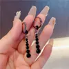 Brincos de Borla de Ônix Elegantes Moda Estilo Coreano Feminino Simples Estilo Frio Celebridade da Internet Brincos de Cristal Brincos com Senso Avançado