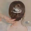 2022 Nuevo Tocado de Alta Calidad Negro Pistola Diamante Brillante Clip Retorcedor de Cabello Mariposa Clip de Borla de Lujo Ligero Accesorios para el Cabello de Una Palabra
