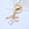 Llavero de Guirnalda de Conejo con Corazón de Chica Linda y Flor de Cerezo Colgante para Cadena de Bolsas de Auriculares AirPods