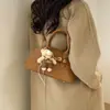 Bolso de Mano Retro de Concha de Gama Alta para Mujer 2026 Nuevo Nicho Versátil para el Trabajo y el Viaje al Trabajo Bolso Tote Pequeño de Hombro Cruzado