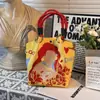 Design de Nicho Bolsa de Mão Vermelha com Padrão para Casamento Bolsa de Presente Festiva em Lona Saco de Balde de Mão com Estampa de Natal Ano Novo