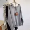 Sudadera Pulóver de Hombro Caído de Manga Larga Color Gris Cachorro Otoño Temprano para Mujer Otoño 2025 Nuevo Estilo Perezoso Holgado Top sin Hombros