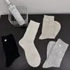 Nuevos calcetines para mujer de primavera y verano, calcetines de rejilla con patrón floral oscuro de botones, calcetines de tubo hueco, calcetines de pila, color sólido, calcetines finos estilo coreano