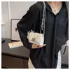 Bolso de cadena acolchado estilo Chanel para mujer, nuevo bolso cruzado mini de moda versátil 2026, bolso cuadrado pequeño popular