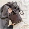 Bolso de mano para mujer muy elegante, nuevo modelo de verano 2026, ambiente relajado, moderno, moda nicho, diseño único, bolso cubo para hombro y cruzado