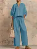 Comercio exterior transfronterizo europeo y americano ropa de mujer verano 2026 nuevo conjunto casual holgado de color liso con cremallera cuello redondo pantalón de pierna ancha para mujer