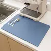 Tapete Drenante de Couro Absorvente de Água de Terra Diatomácea Transfronteiriço para Mesa de Cozinha Doméstica, Resistente a Manchas e Fácil de Cuidar, Pode Ser Personalizado e Enviado