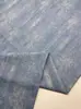 Tela de mezclilla lavada con efecto desgastado y estampado de copo de nieve, tela para prendas de vestir, suave y no elástica, gran ancho, abrigo, pantalones, falda