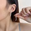 Estilo de celebridad Aretes largos colgantes europeos y americanos aguja de plata línea elegante versátil geométrico arco aretes de cola de pez aretes para mujer moda