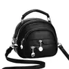 Bolsas de mujer Taizhou 2026 nuevo modelo bolsa redonda pequeña, bolso de hombro, bolso cruzado, bolso casual versátil, bolsa de manzana, venta directa de fábrica