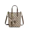 Elegante bolsa de mão pequena estilo vintage para mulheres 2026 novo modelo bolsa de telefone com estampa retrô bolsa de ombro versátil para mulheres bolsa transversal