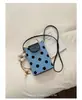Moda de verano transfronteriza para mujer, bolso pequeño 2026, nuevo bolso tipo cubo de lunares, bolso sencillo para hombro cruzado, bolso para teléfono
