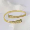 Pulsera geométrica de cruz hip-hop europea y americana microincrustada con circonita pulsera simple de personalidad para mujer una generación de pelo