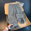 Pantalones jacquard de estilo retro americano con estampado oscuro, colección de otoño para hombre, con un diseño fluido de alta gama, corte recto y un ajuste relajado y holgado para uso casual