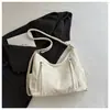 2026 Nuevo Color Sólido Gran Capacidad Texturizada Moda Tendencia Casual para Viajes al Trabajo Bolso de Hombro Tote Multifuncional