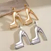 Brincos Europeus e Americanos Transfronteiriços de Metal Brilhante em Formato de Sapato de Salto Alto, Brincos Modernos e Criativos, Brincos de Nicho de Alta Qualidade para Mulheres