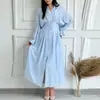 Verão 2026 Nova Roupa Feminina Transfronteiriça Europeia e Americana Vestido Slim Elegante Cor Sólida Cintura Marcada Botões Vestido Longo