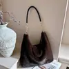 Bolso de felpa moteado retro de invierno de nicho estilo coreano, nueva colección 2026, de alta gama, moderno y con textura, bandolera con cadena
