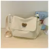 Bolsa fofa de urso estilo japonês para mulheres, bolsa carteiro para estudantes, bolsa de ombro versátil e casual para passeios e compras, bolsa transversal