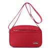 Bolsa Transversal Leve para Mulheres 2026 Nova Bolsa de Nylon Feminina Cor Sólida Tecido Bolsa Pequena Bolsa de Ombro para Mãe Bolsa Casual de Lona