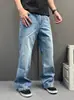 Jeans retro acampanados de línea dividida azul para hombre, adecuados para el uso diario y para ir al trabajo, con un diseño holgado, de pierna recta, ligeramente ancho y fluido, un par de pantalones de moda