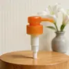 Suministro 30MM cabeza de bomba de plástico de detergente de limón bomba de emulsión de detergente para frutas y verduras 33/410 tapa plana cabeza redonda bomba de presión