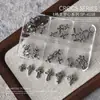 Joias para Nail Art Liga Retro Coração de Corvo Cruz Punk Estrela Negra Explosiva Acessórios Metálicos para Unhas Caixa com 6 Compartimentos