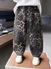Pantalones casuales de primavera y otoño para niño con estampado de leopardo, estilo coreano, pantalones largos elegantes y versátiles para niños, pantalones de comercio exterior para niños pequeños