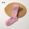 Medias nuevas de primavera y otoño transfronterizas para niños, versátiles para usar como prenda exterior, color liso, rayas verticales, lisas, leggings para niñas, venta al por mayor