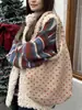 510131 2025 Outono e Inverno Nova Bolsa Feminina Bolsa Tote Coração de Lã de Cordeiro Bolsa de Ombro Feminina Bolsa de Mão Colete