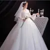 Vestido de Novia Elegante Estilo Bosque 2026 Nuevo Estilo Manga Larga Cuello en V con Encaje Sencillo y Diseño Largo hasta el Suelo