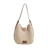 Bolso de axila de alta gama estilo coreano para mujer, Nuevo y moderno 2026, Bolso tipo cubo de gran capacidad de paja para primavera, Simple y versátil
