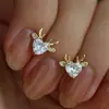 Pendientes Cao Shi Exquisitos de Corazón de Astas Europeos y Americanos para Mujer, Incrustados con Circonita, Joyería Linda para Dama, Estilo Festivo de Navidad