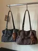 Bolso tote de lunares de nicho de estilo coreano muy elegante, nuevo modelo otoño 2026, bolso de hombro casual de gran capacidad para el trabajo y los desplazamientos