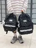 Mochila linda con estampado de gatito estilo japonés para estudiantes mujeres, mochila casual estilo coreano con ribete de encaje, ligera y de gran capacidad