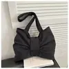 Bolsa de Ombro de Nylon Casual Doce Versão Coreana Transfronteiriça para Mulheres 2025 Novo Design de Nicho Bolsa Tote de Lona de Grande Capacidade