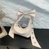 Bolso de Hombro Individual Estilo Dulce y Fresco de Gama Alta para Mujer 2025 Nueva Moda Bolso Personalizado con Remaches Bolso de Celebridad de Internet con Lazo Bajo el Brazo