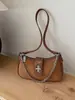 Bolsa de ombro com alça de trava, design de nicho, bolsa transversal para o dia a dia, versátil, estilosa, simples, bolsa de mão moderna