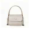 Bolso bandolera de un solo hombro simple y versátil para mujer, bolso bandolera pequeño cuadrado texturizado estilo vintage para el día a día, nuevo modelo primavera-verano para mujer