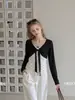 Camiseta corta LiLvi de lunares con lazo, estilo dos piezas, top de otoño de manga larga ajustado para mujer
